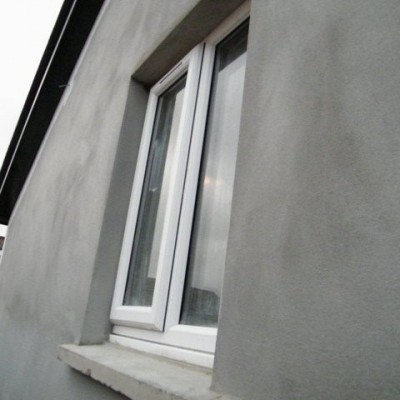 Freshly rendered gable end wall