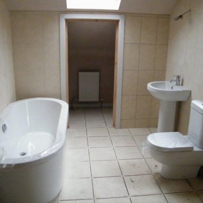 Bathroom after new plaster and tiles Tunbridge Wells