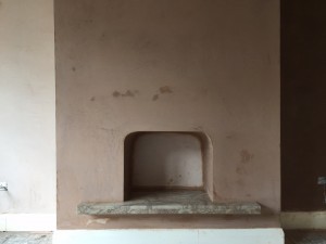 Finish photo of Fire place re plastered
