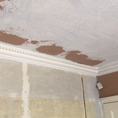 Holes and cracks in Artex ceiling filled and mesh added for strength .prepared for skim coat