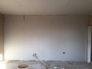 Plasterboard bonded to wall. Dot & dab