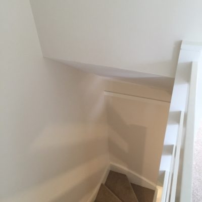 Painted hallway after plaster