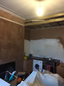 Walls repaired & ready for new kitchen & painting
