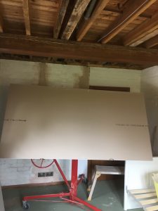 Plasterboard been lifted into position, Five Ashes