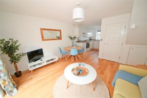 At Southborough finished photograph of living and kitchen area