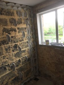 Adhesive (Dabs) placed on wall