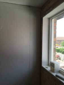 Plasterboard around window