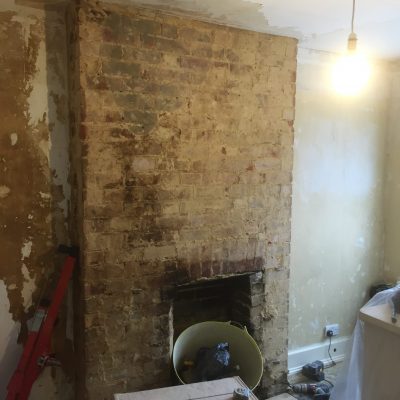 Loose plaster removed prior to Plastering