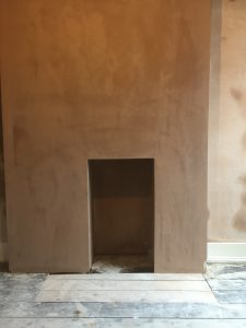 Fire place opening plastered as a feature